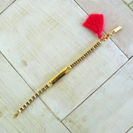 PULSERA DORADA CON BORLA